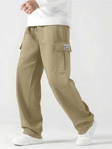 男士休闲工装裤，宽松直筒版型，垂感好，适合居家休闲和户外活动，也是情侣送礼佳品。采用100%涤纶面料，配有抽绳腰带，可调节松紧，多种颜色可选。