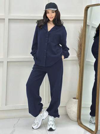 2-delat damset med casual passform, topp med knappar fram och fickor med lång ärm och resår i midjan med fickor, långa byxor, höst