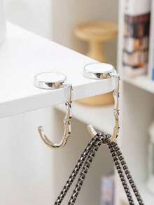 1/2 pièces Crochet de sac créatif, crochet de sac à main, support de rangement pliable, porte-clés portable en alliage, crochet de table. Accessoires de rangement pour sac à la maison. Crochet de rangement portable pour sortie des femmes, crochet pour sac