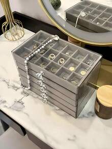 Caixa organizadora de cosméticos elegante para bancada, com 54 compartimentos e 5 camadas, superfície polida, feita de plástico leve. Possui gavetas para guardar brincos, colares e anéis. Não precisa de eletricidade. Design compacto - o presente perfeito para a véspera de Natal. - Multicolorido - Ver 13