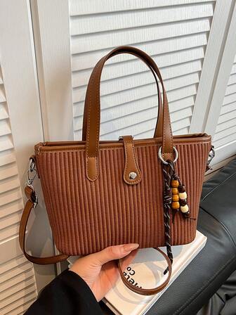 Borsa a secchiello coreana minimalista e chic, nuova borsa di alta qualità e stile alla moda, borsa a spalla/a tracolla con pendente