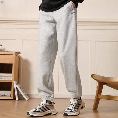 Adidas Pantalones deportivos Adidas para hombre, modelo otoño/invierno 2025, de punto, con forro polar, ideales para entrenamiento y uso casual.