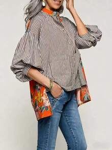 女式条纹梭织面料长袖纽扣前襟上衣，花卉撞色立领和常规下摆，打造端庄时尚