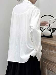 Áo sơ mi nữ dài tay dáng rộng bất đối xứng thanh lịch, màu trơn, chất liệu vải dệt, cài nút, phù hợp cho công sở, mặc hàng ngày, sân bay, mùa xuân/hè. Màu trắng. - trắng - Xem 2