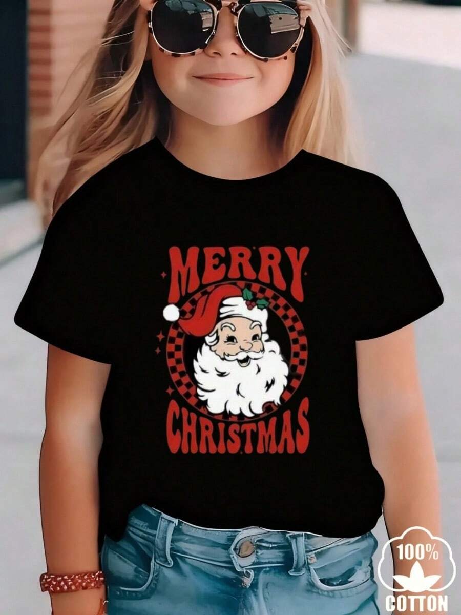 Esta nueva y moderna camiseta de manga corta 100 % algodón para niña luce un estampado navideño. Esta camiseta holgada, informal y versátil está confeccionada con un tejido suave y agradable para la piel de tu bebé. Ya sea para una reunión familiar, un evento escolar o una salida de juegos al aire libre, esta camiseta permite que tu hija se mueva con libertad y comodidad. - Negro - Ver 1
