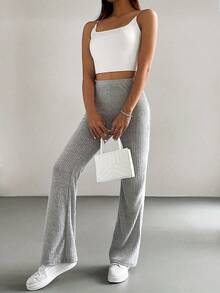 Novedades en moda femenina: pantalones casuales elásticos de cintura alta, sencillos, de color liso, con ribetes y corte ajustado, ligeramente acampanados, nuevo estilo para primavera/otoño, pantalones acampanados, pantalones casuales de color liso para mujer, de punto acanalado, pantalones ajustados versátiles y a la moda. - Gris - Ver 6