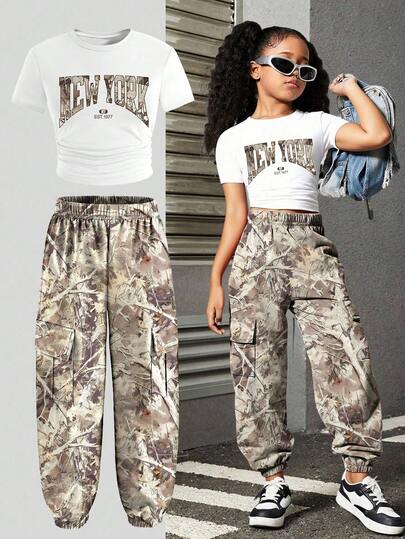 Conjunto casual de camiseta de manga corta con estampado gráfico de letras y pantalones cargo de camuflaje para niña