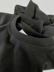 Texto con la palabra Champion en estilo energético simbolizando fuerza superación y espíritu deportivo que inspira confianza y actitud positiva camiseta de mujer 100% algodón suave cómoda para uso diario - Negro - Ver 5