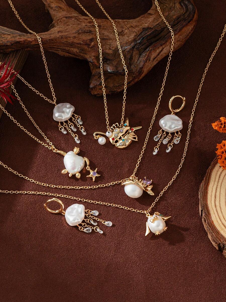 这款趣味十足、可爱又时尚的珍珠、小鱼、水母、企鹅灯笼鱼项链，镶嵌锆石并镀18K金，尽显魅力，个性十足，适合女性日常穿搭、派对、音乐节等场合佩戴。镀金首饰，女士首饰。 - 彩色 - 查看 1