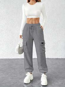 Pantalones ligeros de verano para mujer, con un diseño de corte holgado en color liso y cintura ajustable. Adecuados tanto para actividades deportivas como para el uso diario. (Nota: el primer producto utiliza un tejido más ligero y fino, tiene un precio más bajo y es de calidad estándar. Si esto le preocupa, le recomendamos que no lo compre). - Gris Oscuro - Ver 3