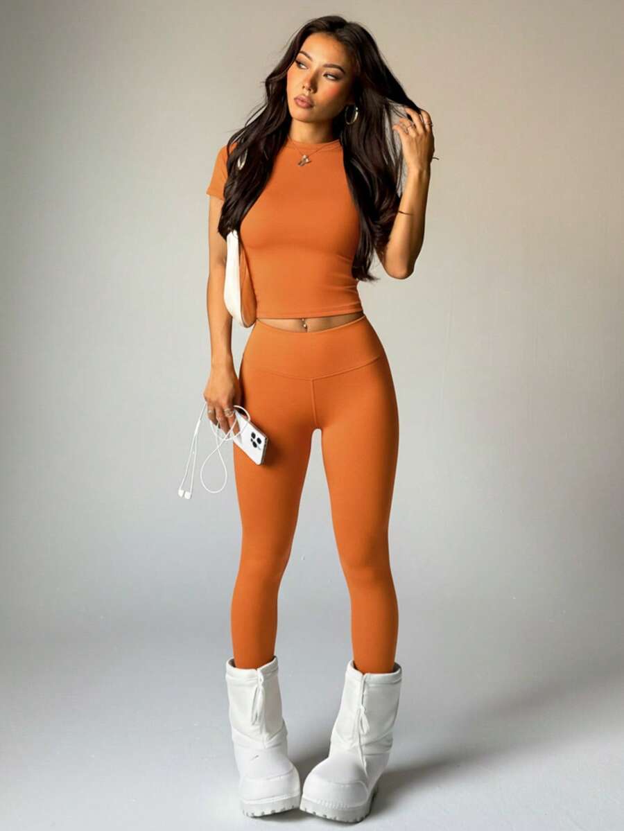 2 Pcs Set Women Casual Solid Color High Elastic Short Sleeve T-Shirt And High Waist Legging Sports Suit Gym Set Workout Women Set Women Leggings Set - 橘色 - 查看 1