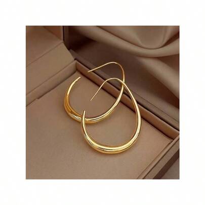 A Pair Of Minimalist Chic Teardrop-Shaped Hoop Earrings Exuding Elegance Perfect For Ladies To Wear To Parties And Vacations.