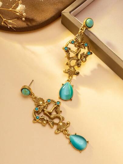 Vintage Turquoise & Gold Mermaid Earrings Bohemian Style Mermaid Drop Earrings Vintage Ocean-Themed Turquoise Teardrop Earrings Intricate Gold Mermaid Carved Earrings Turquoise Accented Vintage Mermaid Earrings Ocean-Themed Party: Pair With A Bohemian-Style Maxi Dress To Create A Rich, Vintage Ocean Vibe. Bohemian Style Outfit: Combine With A Fringe Top And Denim Pieces To Showcase A Free-Spirited Boho Aesthetic.