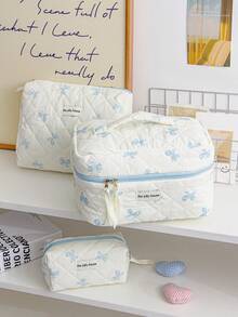 1 件米色底蓝色蝴蝶结便携式旅行绗缝包，适合返校季、万圣节等场合，可作化妆包使用。时尚休闲大容量便携拉链化妆包，旅行文具收纳包，度假必备化妆包，可收纳耳机、充电器、口红、化妆品、香水、护肤品和美容产品，家居装饰，适合妈妈、护士、学生、女学生、钥匙等，节日礼物，化妆包，旅行必备 - 藍色 - 查看 3