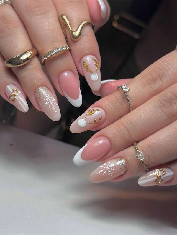 ARTAUG 24 uñas postizas largas de almendra con diseños navideños de renos, copos de nieve y cintas doradas, con puntos de copos de nieve en todo el diseño. Incluye 1 lima de uñas y 1 kit de pegamento para uñas. Ideal como regalo para niñas y mujeres para fiestas, citas y uso diario.