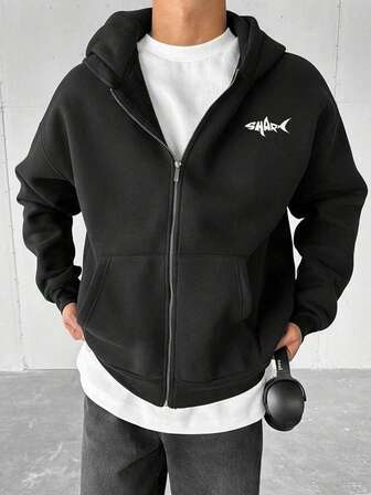 El jersey con capucha negro puro para hombres con diseño de solapa con cremallera y parte superior deportiva casual