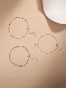 Nooxian 3件套银饰时尚休闲银色铜锆石心形吊坠，配波浪链、唇形链和普通链，三层手链套装，适合女性日常佩戴 - 銀色 - 查看 3