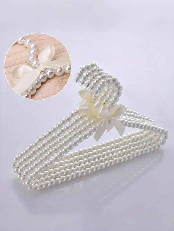 5 Piece Of Faux Pearl Hanger With A Bow, Faux Pearl Pants Clip, And Pet Hanger. The Hanging Clothes Support Is Suitable For Hanging Fairy-Style Clothing Items Like Dresses, Trousers, Shoes, Jeans, Boots, And Skirts.