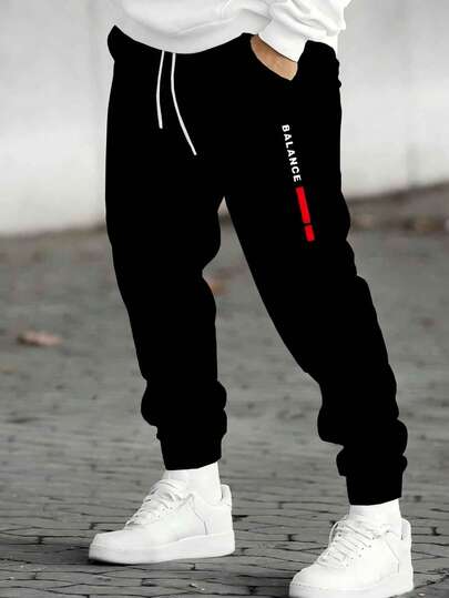 Stora herrbyxor i svart med "Balance"-tryck - Dragsko i midjan, polyesterstickning, bekväma och moderiktiga, lämpliga för höstens utomhusaktiviteter, sport och fritidskläder | Moderiktiga sportbyxor | Polyesterstickade byxor