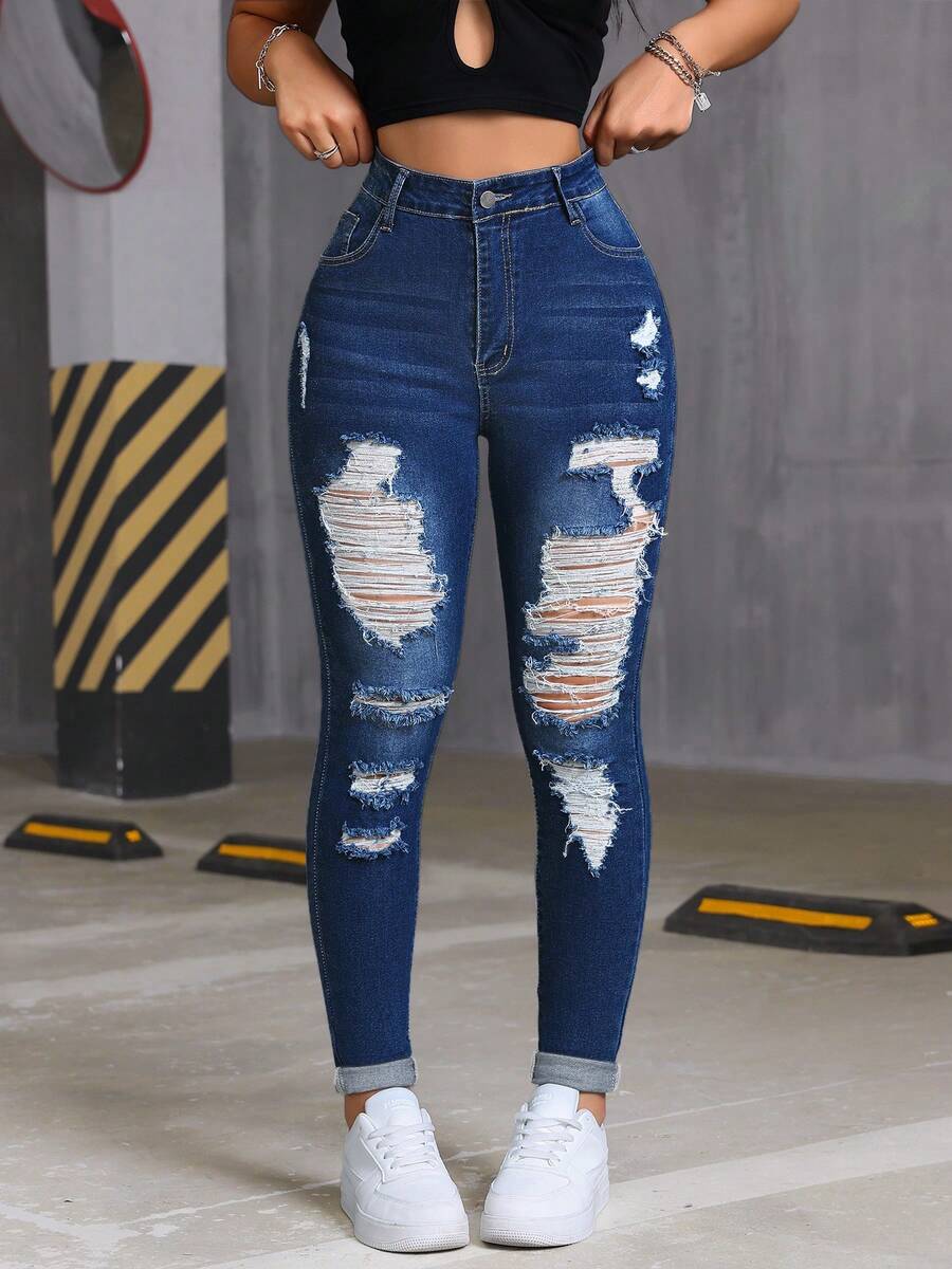 女士修身破洞牛仔裤，高腰性感设计，带口袋，做旧细节，拉链闭合。这款高腰修身浅色水洗棉质牛仔裤适合春秋季休闲穿着，也适合圣诞节和其他场合。度假 - 深海藍色 - 查看 1