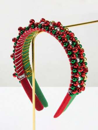 1件圣诞发箍，饰有红绿相间的天鹅绒圣诞铃铛串珠，简约时尚，是节日红绿主题发饰的理想之选。精致的ins风发饰，尽显优雅气质。
