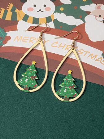 Ett par urholkade julgransörhängen i metall lämpliga för flickor som julklappar och kläder