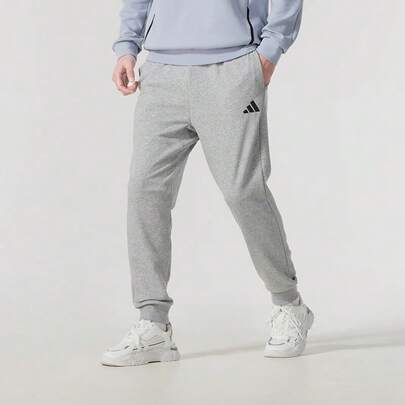 阿迪达斯男士2026冬季新款休闲简约抽绳运动裤 JE3855