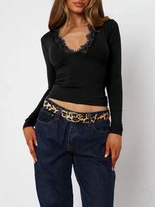 Blusa a maniche lunghe da donna corta con scollo a V, stile Y2K fashionable e sexy, con bordo in pizzo