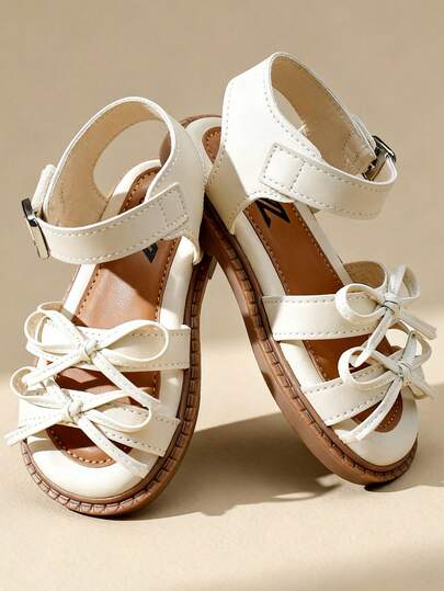 1 Çift Kız Çocuk Sandalet, Fiyonk ve Metal Toka Detaylı, Suni Deriden Üretilmiş, Kaymaz ve Dayanıklı, Açık Burunlu, Alçak Topuklu, Şirin Günlük Stil, Yaz Plaj Gezileri/Açık Hava Tatilleri İçin Uygundur