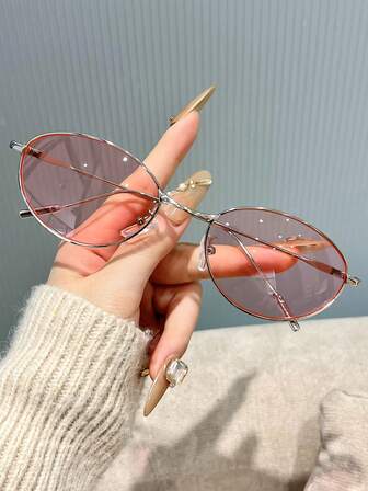 1副女士椭圆形金属框时尚眼镜，时尚沙滩配饰