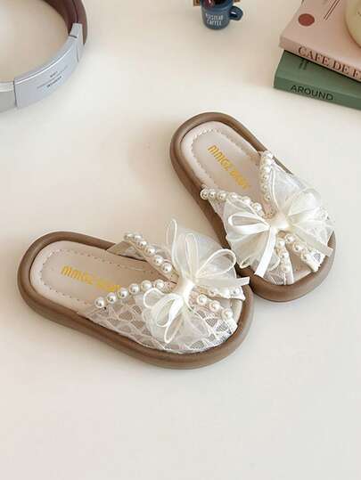 1双女童蕾丝蝴蝶结装饰公主软底凉鞋，夏季新款幼儿沙滩拖鞋，时尚休闲女童拖鞋