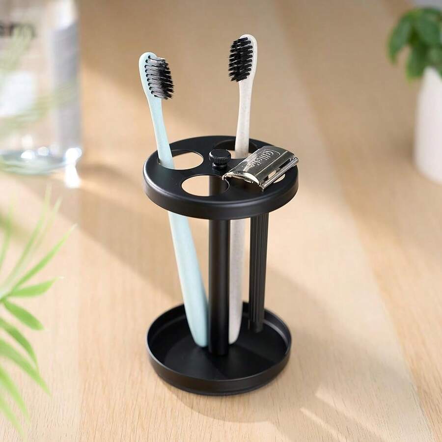 Soporte para cepillos de dientes de acero inoxidable negro: Organizador de encimera de baño resistente a la oxidación, 4 ranuras ventiladas para sostener cepillos de dientes manuales, maquinilla de afeitar, tubo de pasta de dientes, organizador compacto antideslizante para el lavabo - Negro - Ver 1