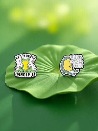 1 /2 Pieces Of A Whimsical And Humorous Flat-Laying Frog Design Featuring The English Letters "IF I AM MOODGIVE ME," A Meditative Frog Shape Combined With The Letters "LET KARMA HANDLE IT." Alloy Lapel Pin, A Creative Unisex Letter Badge, Ideal For Personalized Clothing, Bags, And Accessory Accessories.