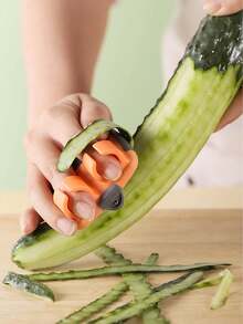 1件装果蔬削皮器，指握式蔬菜削皮器，不锈钢指掌式削皮器，土豆削皮器，多功能瓜类切片器，手持式削皮器，水果削皮器，苹果削皮器，削皮器，蔬菜削皮器，削皮器，黄瓜切片器，多功能蔬菜切片器，瓜类切片器，削皮器，土豆加工工具，不锈钢果蔬削皮器 - 彩色 - 查看 3