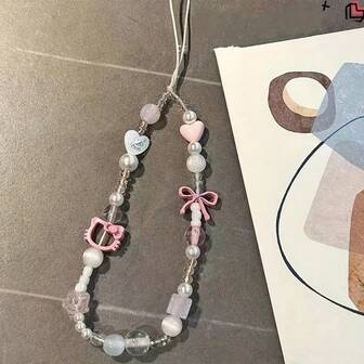  Correa para teléfono y llavero de Hello Kitty, de Sanrio, con un adorable diseño de cuentas rosas, decorado con perlas y un colgante con forma de corazón, hecho de polímero ABS resistente, adecuado para mujeres, niñas y fans de Sanrio, un regalo ideal para cumpleaños y el Día de San Valentín