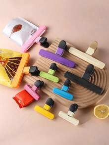 Kẹp khoai tây chiên, Kẹp niêm phong cho các túi thực phẩm khác, Có thể sử dụng để niêm phong túi thực phẩm trong nhà bếp, Để bảo quản thực phẩm, Kẹp đồ ăn nhẹ, Kẹp niêm phong dụng cụ nhà bếp, Giữ các tài liệu quan trọng được sắp xếp trong văn phòng, Đa năng và thiết thực, Không thể thiếu trong bất kỳ gia đình nào, Không thể thiếu cho quà tặng Giáng sinh, du lịch và bảo vệ thực phẩm tại nhà khỏi độ ẩm - màu xanh lá - Xem 9