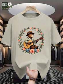 Camiseta Gráfica para Hombre - Oso Tocando la Guitarra en Marco Floral (Rosa/Verde/Azul) - 100% Algodón Suave y Transpirable, Corte Regular para Looks Casuales y Formales - Esencial de Verano Lavable a Máquina por GILDAN, Camiseta Artística, Tejido No Transparente - Caqui - Ver 2