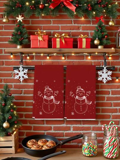 Conjunto de 2 panos de prato natalinos com estampa de boneco de neve vermelho de braços abertos, ideais para limpeza diária e decoração de inverno.