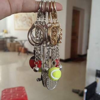 3件套运动风格金属装饰挂钩，包括乒乓球、棒球和网球图案