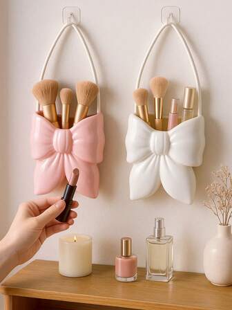1个蝴蝶结化妆品收纳盒，壁挂式化妆品收纳架，可收纳刷子、口红和香水，装饰性梳妆台展示架