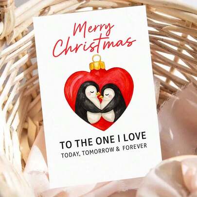 "오늘, 내일 & 영원히 사랑하는 사람에게 메리 크리스마스"라는 따뜻한 문구가 담긴 로맨틱한 카드. 축제 분위기의 하트 모양 장식에서 껴안고 있는 두 마리의 사랑스러운 펭귄이 특징입니다 - 커플의 휴일 축하를 위한 호랑가시나무 열매 액센트가 있는 소박한 나무 배경