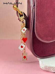 HAILIAN Mặt dây chuyền túi xách bằng kim loại làm từ hợp kim, có hình bài tây, xúc xắc và chó bóng bay, xúc xắc nhiều màu, bài tây, chó bóng bay, dây chuyền kim loại. Có thể dùng làm móc khóa xe hơi, mặt dây chuyền túi xách, quà tặng sinh nhật, quà tặng ngày lễ, quà tặng đầu năm học, cũng có thể dùng làm quà tặng bạn bè, gia đình, người yêu. - Đỏ - Xem 2