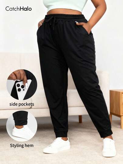 Pantalones deportivos de talla grande para mujer con cintura con cordón y bolsillos, color negro puro, estilo deportivo casual (Mallas de yoga y fitness, otoño/invierno 2025)