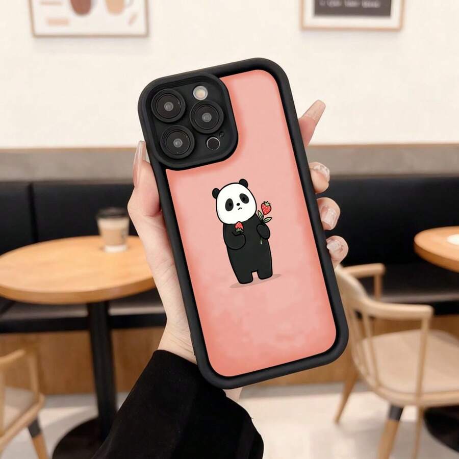 Cubierta de teléfono con borde negro y parte trasera rosa con diseño de panda sosteniendo una flor para uso diario en cafeterías y espacios casuales Aplicable a los teléfonos de la serie Apple y Galaxy - Café integral - Ver 1