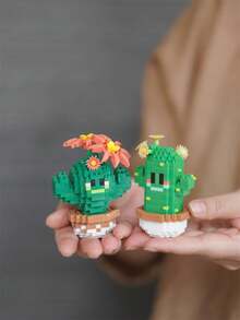 1 盆栽仙人掌积木，情人节礼物，生日礼物，DIY植物系列积木，桌面装饰，减压，缓解压力，家居收藏摆件，拼装公仔，办公桌面摆件，含2500+颗粒的礼品套装。 - 彩色 - 查看 10
