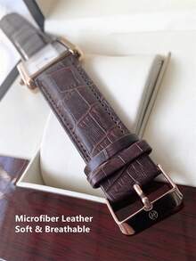 Pablo Raez 这款经典男士腕表套装包含多款产品，这款奢华的长方形男士腕表采用不锈钢复古表壳，饰以永不褪色的迷人玫瑰金点缀，搭配黑色和棕色超细纤维皮革表带，是一款时尚的男士配饰，防水深度达 50 米，并带有罗马数字日历显示，是一款绅士休闲石英腕表。