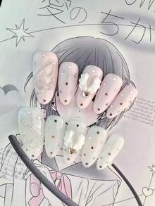 Bộ 10 miếng dán móng tay hình bầu dục màu hồng pastel và trắng, trang trí sao bạc, cánh trắng 3D, pha lê hình trái tim và hạt kim loại, phong cách Kawaii ngọt ngào và Lolita, kèm keo dán móng mini và dũa móng. - Follow Your Heart - Xem 7