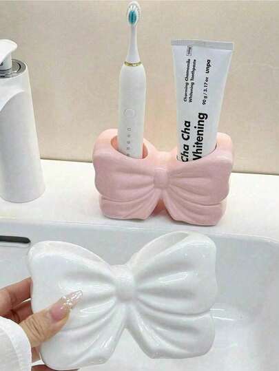 1个北欧风不对称蝴蝶结牙刷架，电动牙刷支架，化妆品收纳架，牙刷整理架，家居桌面装饰架，美观的房间装饰，家居装饰，节省空间的收纳整理，厨房、浴室、卧室配件，家居浴室装饰，夏季