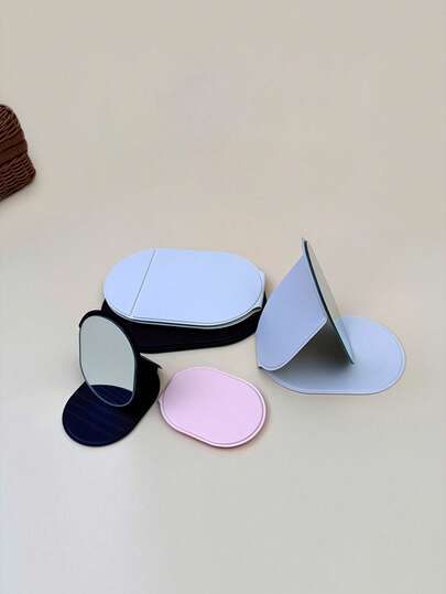 1 قطعة مرآة مكياج محمولة قابلة للطي - تصميم أحادي اللون من مادة البولي يوريثان بسيطة وأنيقة سهلة الحمل مرآة جيب بيضاوية الشكل