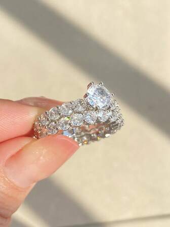 rakol Set de 2 anillos decorados con circonita cúbica de color plateado simple para mujeres